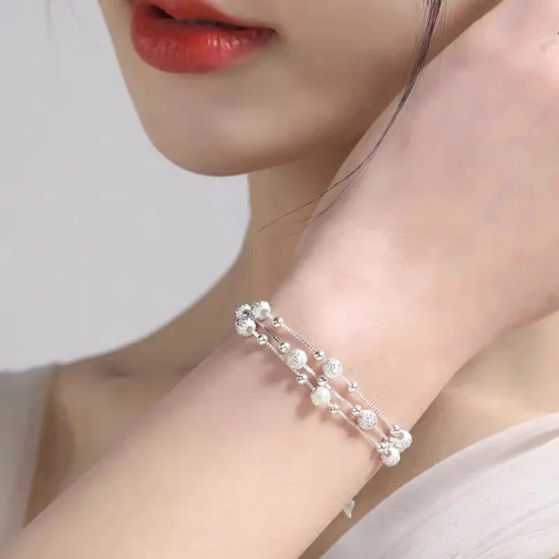 Braccialetto con Perline Portafortuna in Argento Sterling – Eleganza e Significato ✨